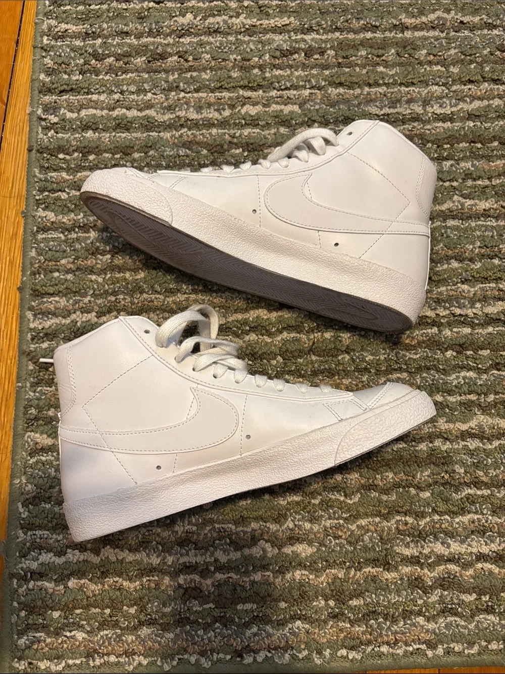 All White High-Top Nike Blazer Sneakers